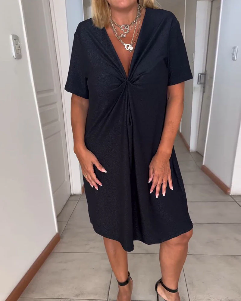 Els | Kleid mit kurzen Ärmeln und V-Ausschnitt - Image 2