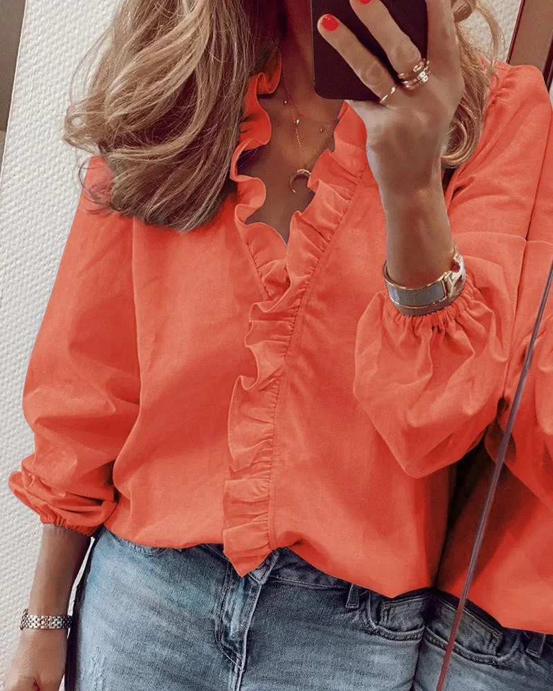 Enola™ | Feminine Bluse mit verspielten Rüschen